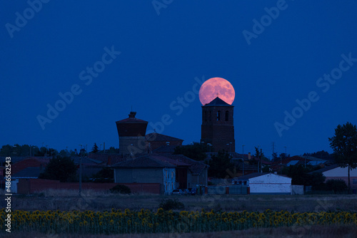 La luna remonta el campanario photo