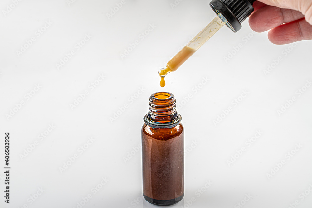 Propolis Drop Oil drop falling. Propolis bee glue natural medicine. Propolis Drop Oil drop falling. Propolis bee glue natural medicine.