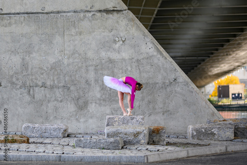 Graceful Urban Ballerina leaned over 