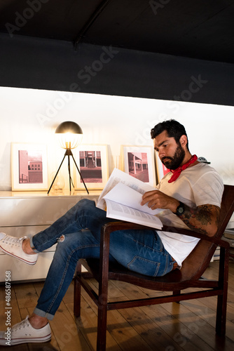Man reading in the living room  photo
