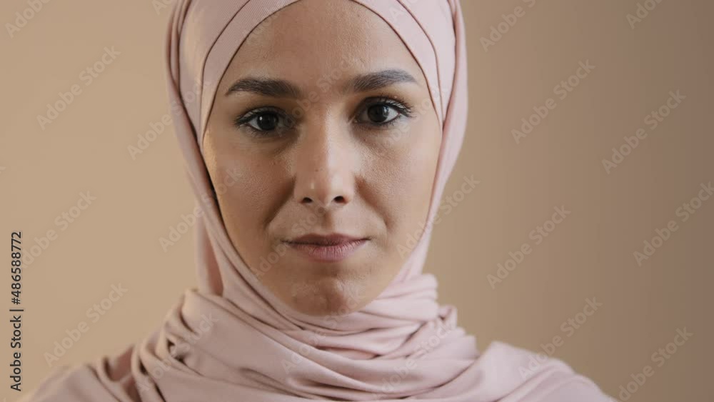 Close-up face young woman in hijab with natural make up muslim girl smiling looking at camera satisfied with services of dental clinic portrait happy islamic arab female laughing healthy white teeth