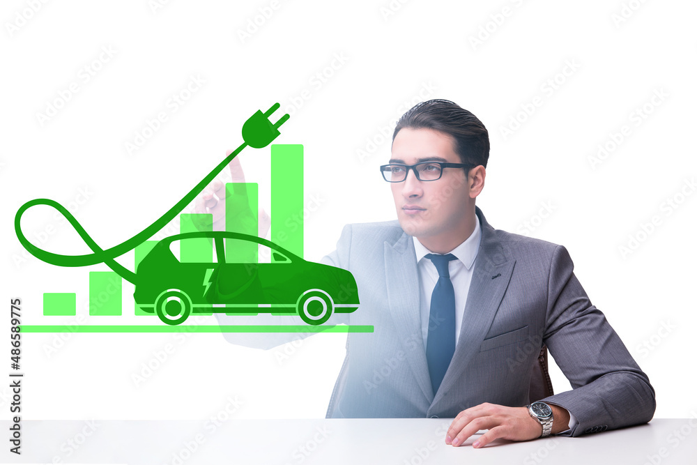 Electric car concept with businessman pressing button Electric car concept with businessman pressing button