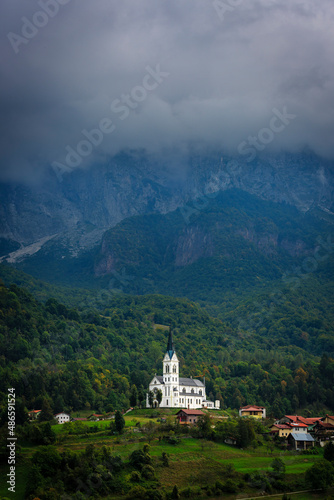 San Fermin Church in the mountain village of Drežnica, beautiful panoramic view, Slovenia