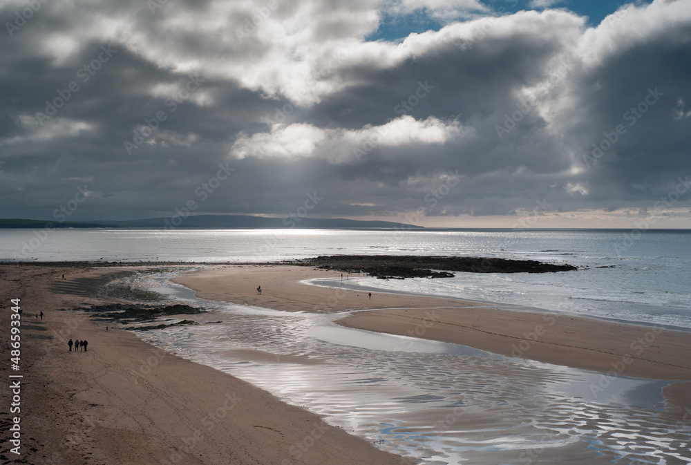 Dramatic cloud beach landscape on the west coast of county Kerry, Ireland