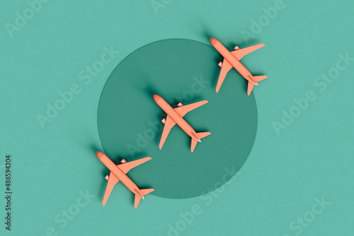 flat lay design of Pink Commercial airplane jetliner  photo