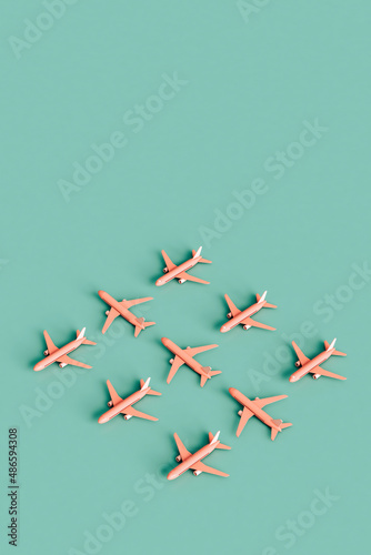 a bunch of Pink boing airplanes. copy space photo