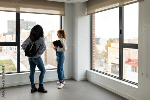 Women at empty office to rent photo