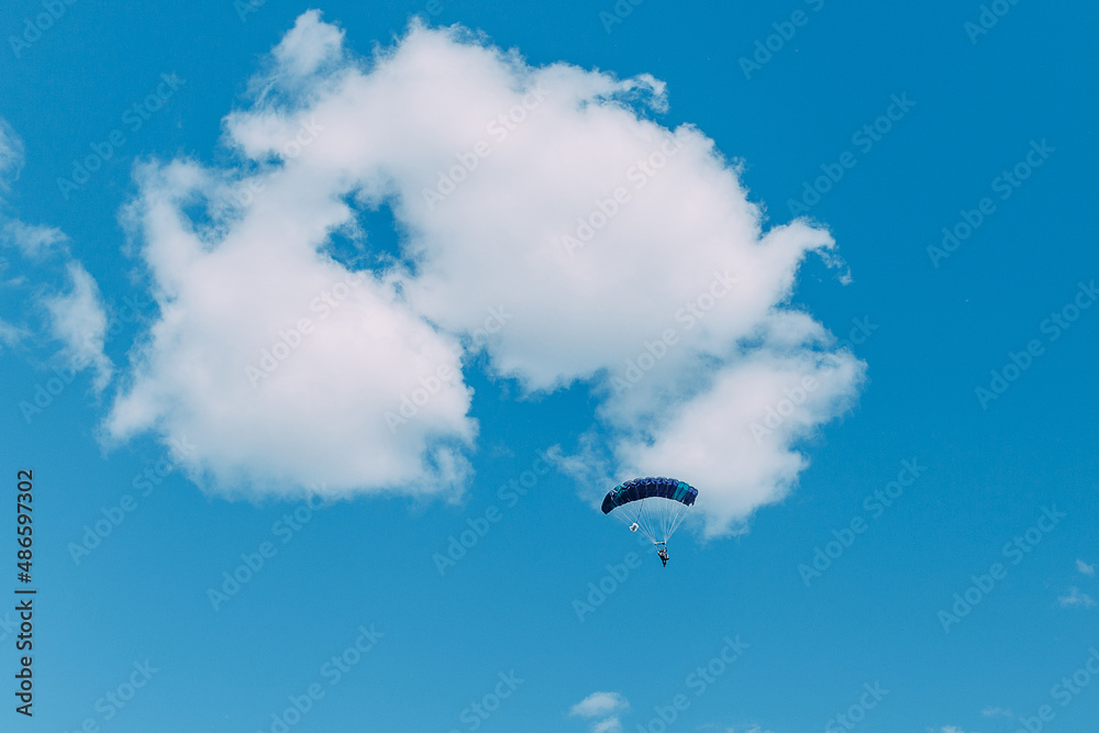 Skydiver. Paratroopers. Parachute. Sky. Dome. Clouds. Liberty. Air. Skydiver. Paratroopers. Parachute. Sky. Dome. Clouds. Liberty. Air.