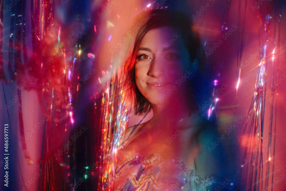 Portrait of smiling woman in party atmosphere Portrait of smiling woman in party atmosphere