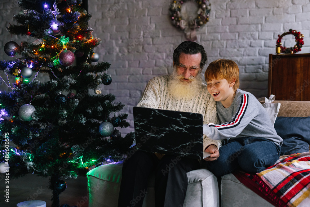 Happy boy and old man together congratulating relatives