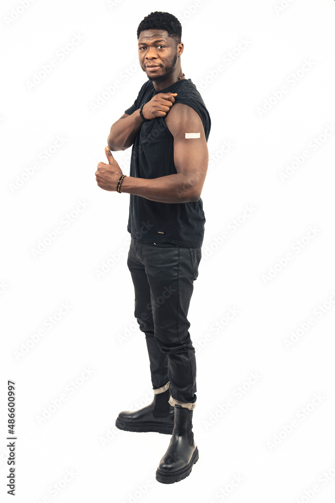 person exhibiting vaccine with his thumb up the white background - full shot. High-quality photo person exhibiting vaccine with his thumb up the white background - full shot. High-quality photo