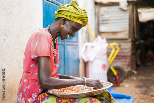 Black woman at market in village