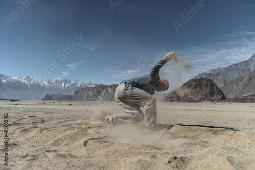Man breaking in the desert 