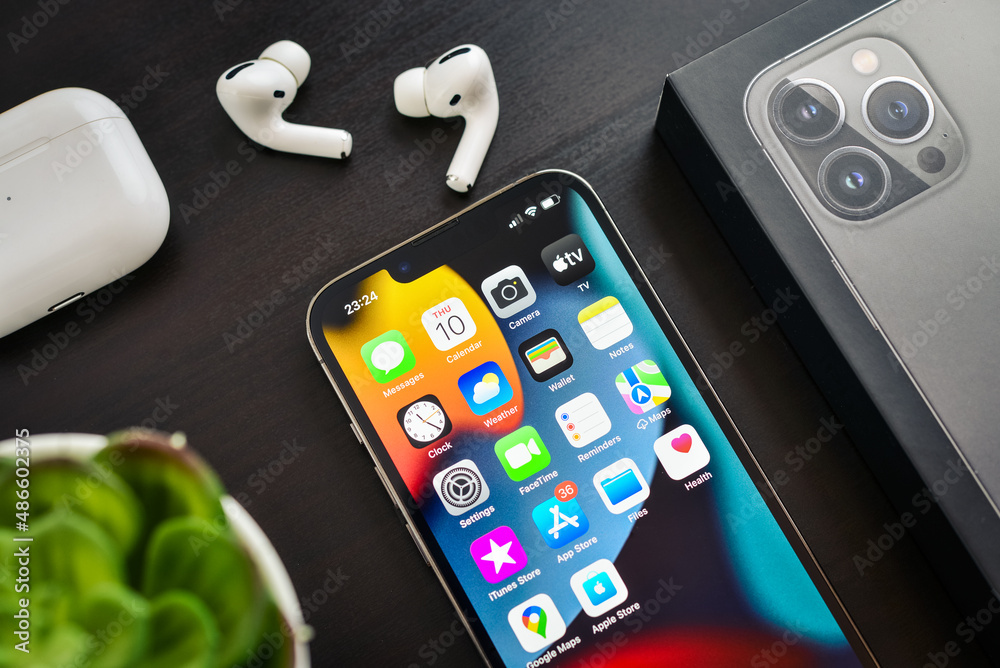 iPhone 13 Pro Space Gray with AirPods Pro Stock-Foto | Adobe Stock