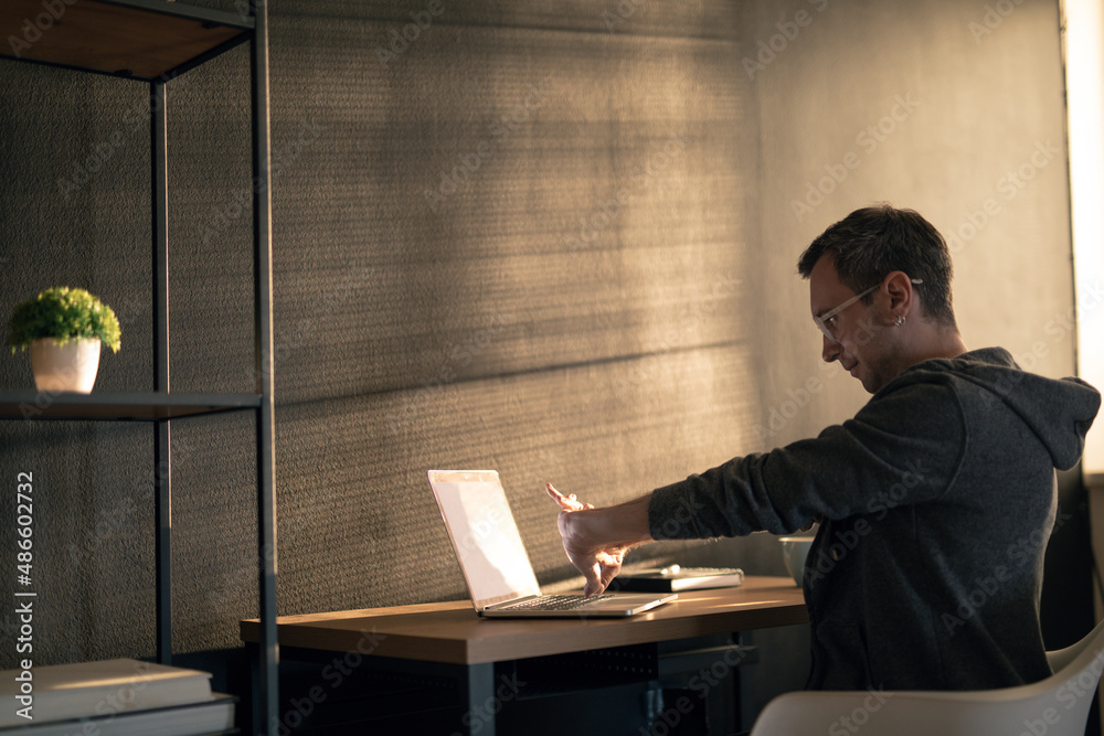 Stretching While Working With Laptop Stretching While Working With Laptop