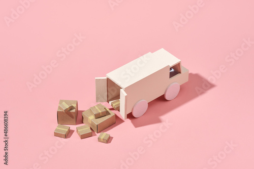 Truck with cardboard boxes. Delivery concept photo
