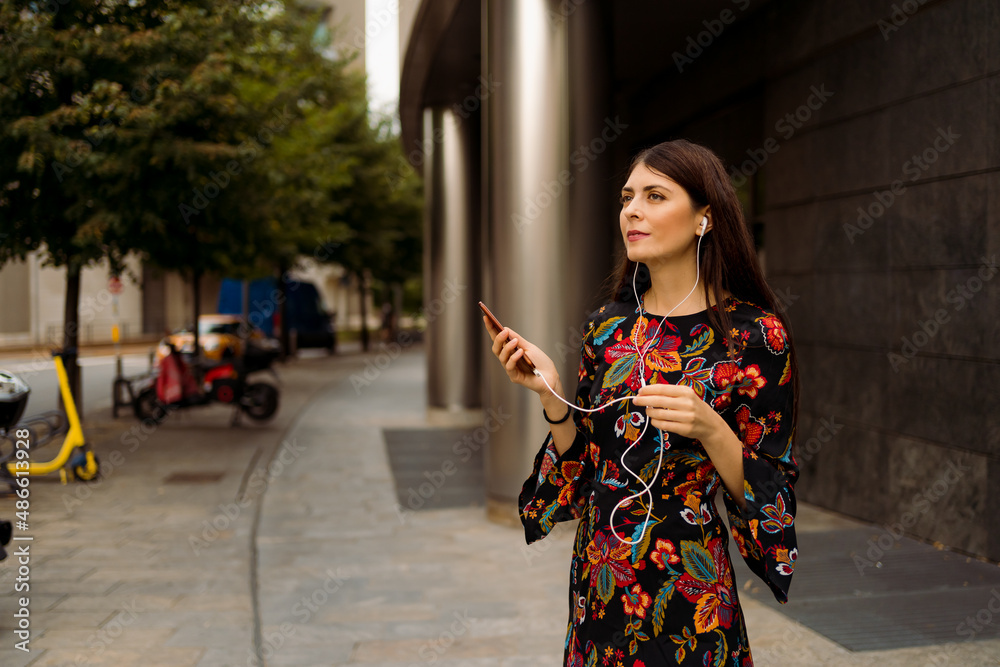 Woman making a call outdoor Woman making a call outdoor