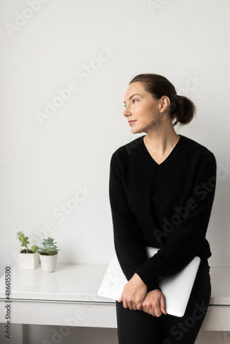 Woman with laptop photo