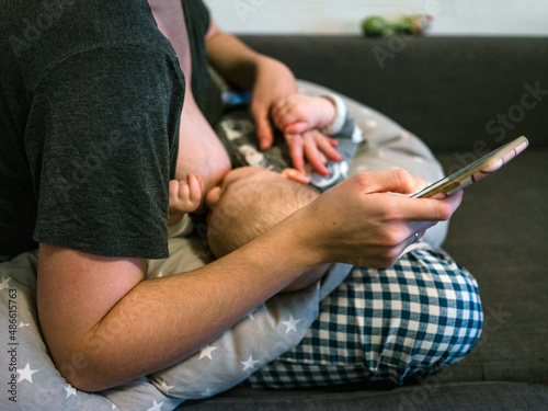 Breastfeeding scrolling phone