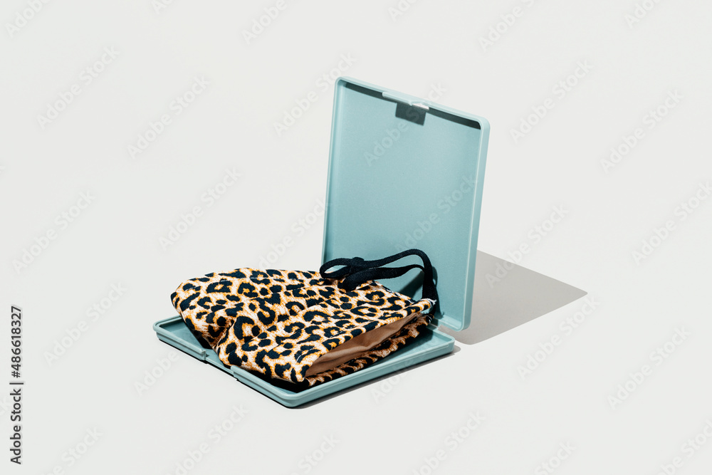 animal print face mask in a plastic case animal print face mask in a plastic case