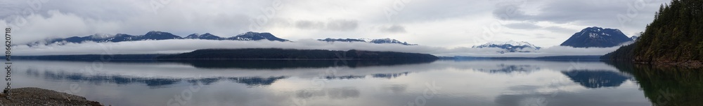 Panoramic view of Harrison Lake with mountains in background. Canadian Nature Background Panorama. British Columbia, Canada. Panoramic view of Harrison Lake with mountains in background. Canadian Nature Background Panorama. British Columbia, Canada.