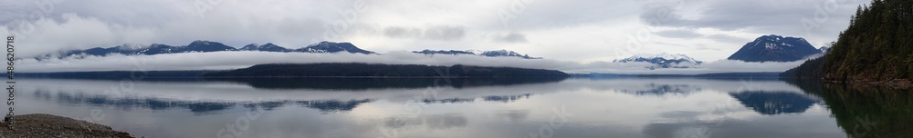 Panoramic view of Harrison Lake with mountains in background. Canadian Nature Background Panorama. British Columbia, Canada.