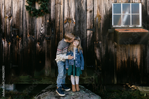 brother and sister hugging 