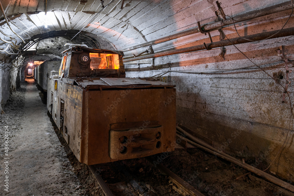 Electric locomotive in an underground tunnel
