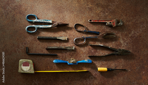 Arrangement  of DIY Tools Shot on Rust Background  photo