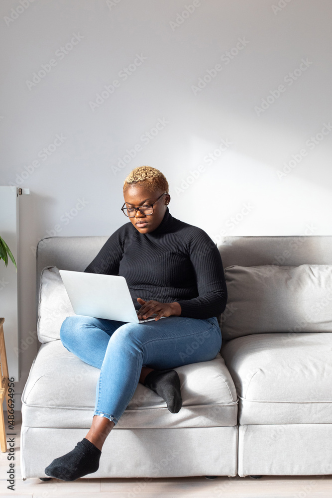 woman using laptop computer at home, freelance job