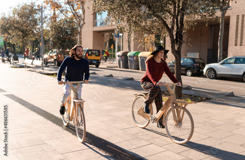 Wallpaper Mural Friends riding timber bicycles on city street Torontodigital.ca