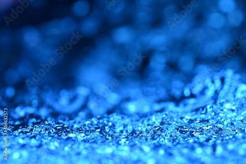 Blue glitter lights texture. Abstract christmas background.