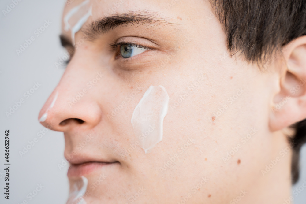 © Olga Kozicka/Stocksy - Man With Cream On His Face