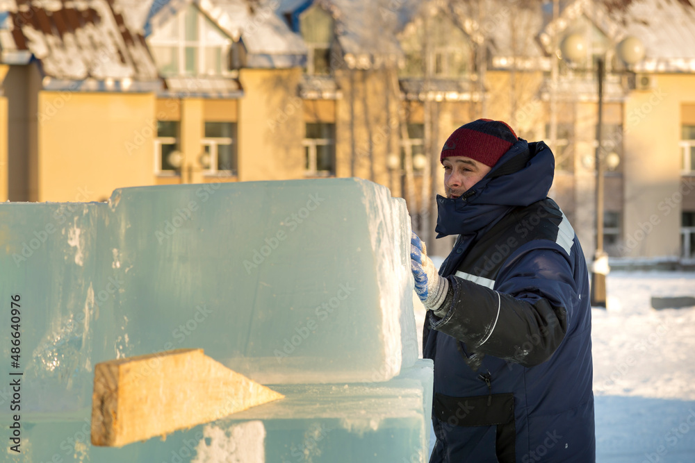 Portrait of the installer at the ice panel Portrait of the installer at the ice panel