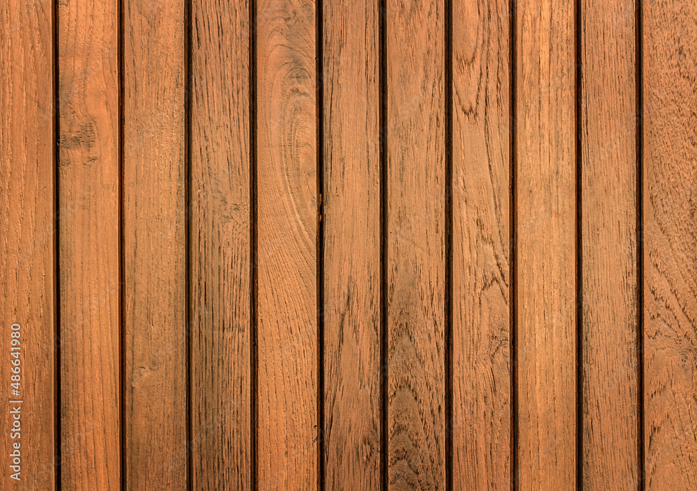 Obraz premium Brown wood texture background coming from natural tree. The wooden panel has a beautiful dark pattern, hardwood floor texture
