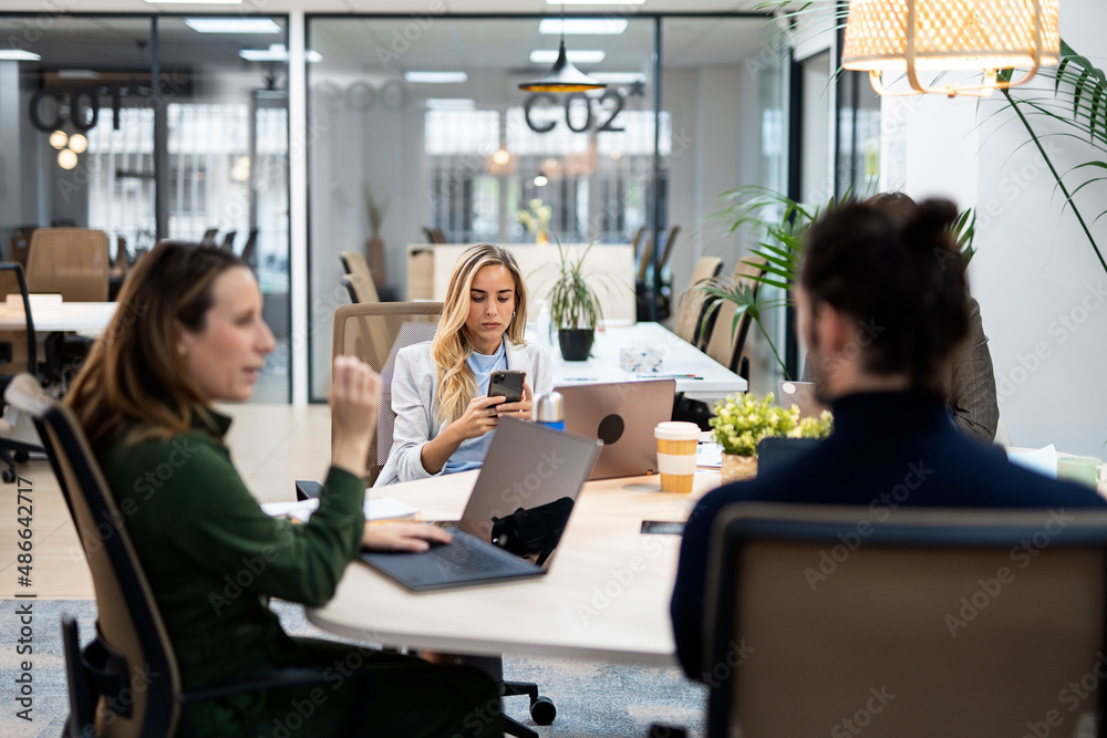 Stock photo of co-workers in a modern office. Stock photo of co-workers in a modern office.
