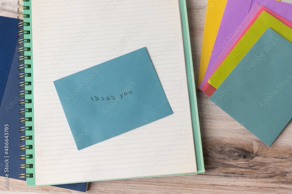 Thank you card and paper Stock Photo | Adobe Stock