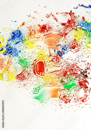 abstract colorful background, oil drops on water. vertical background