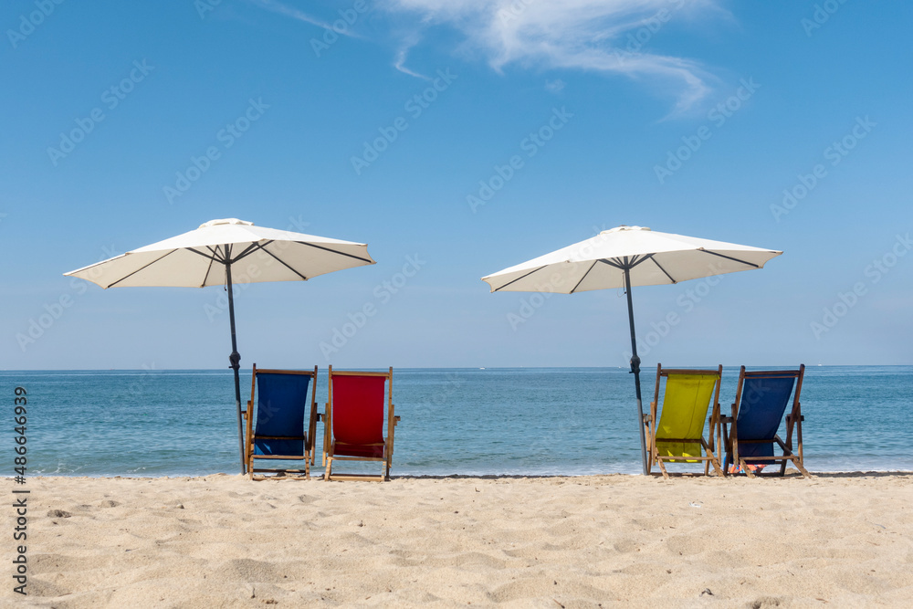 Umbrellas and beach chairs. Umbrellas and beach chairs.