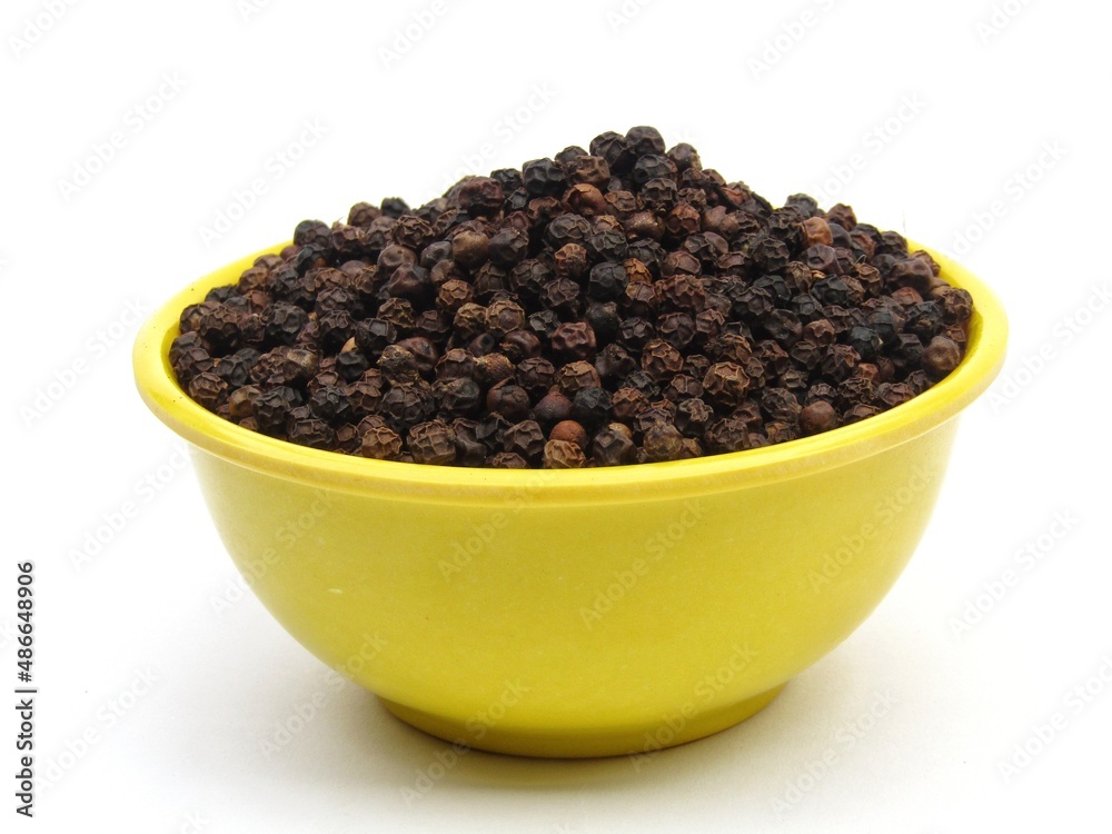 Black peppers in a bowl Black peppers in a bowl