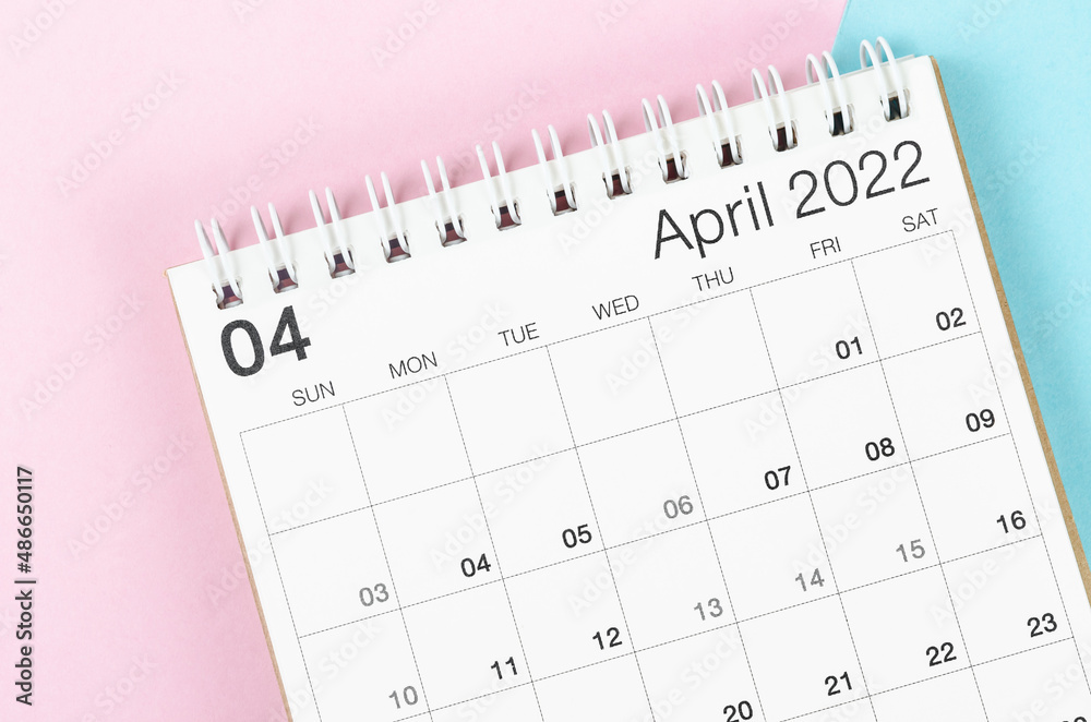 April 2022 desk calendar on beautiful background. April 2022 desk calendar on beautiful background.