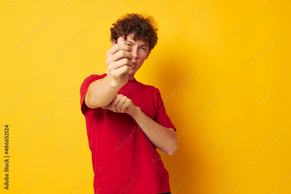 cute red-haired guy in protective masks safety posing isolated background unaltered cute red-haired guy in protective masks safety posing isolated background unaltered