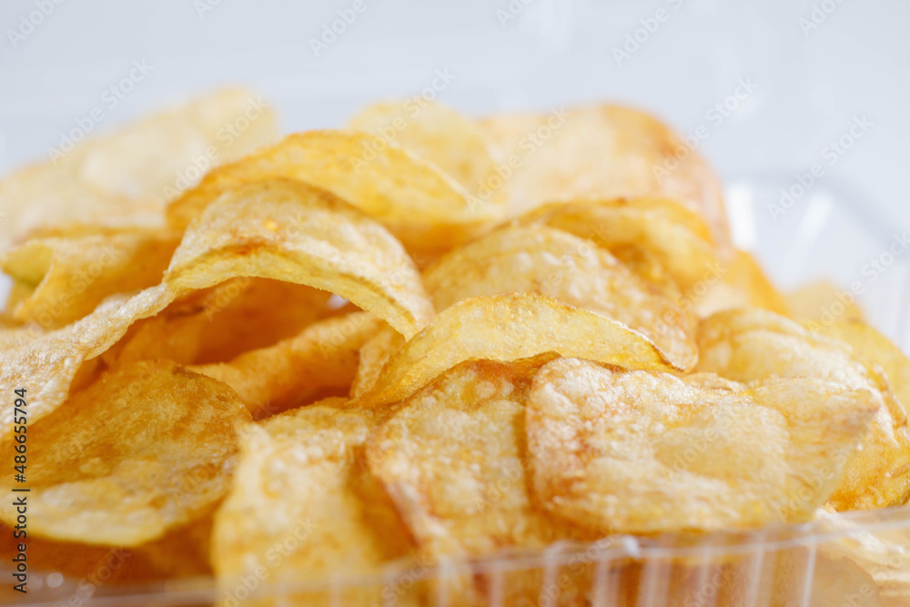 A slide of potato chips on a white background.
