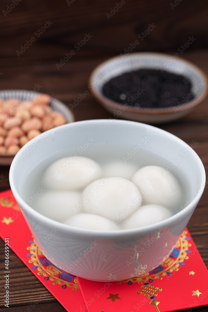 Food dumplings and red envelopes for the traditional Chinese festival Lantern Festival Food dumplings and red envelopes for the traditional Chinese festival Lantern Festival