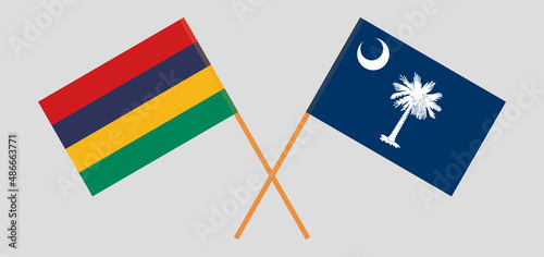 Crossed flags of Mauritius and The State of South Carolina. Official colors. Correct proportion