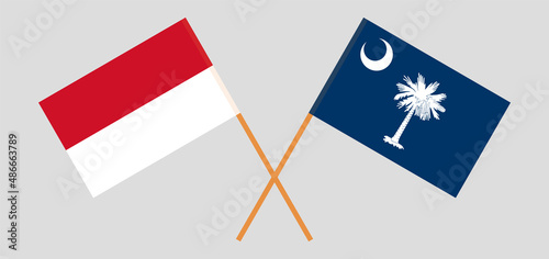 Crossed flags of Indonesia and The State of South Carolina. Official colors. Correct proportion