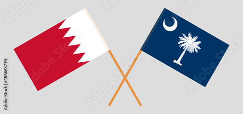 Crossed flags of Bahrain and The State of South Carolina. Official colors. Correct proportion