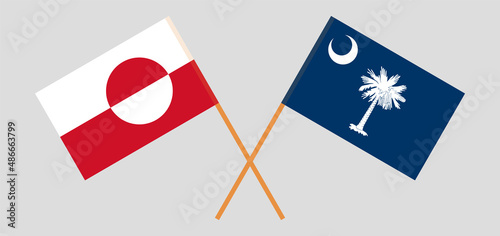 Crossed flags of Greenland and The State of South Carolina. Official colors. Correct proportion