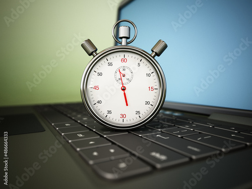 Chronometer standing on laptop keyboard. 3D illustration photo