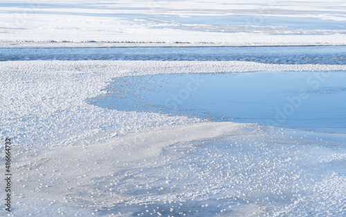 frozen river in winter © la_toja